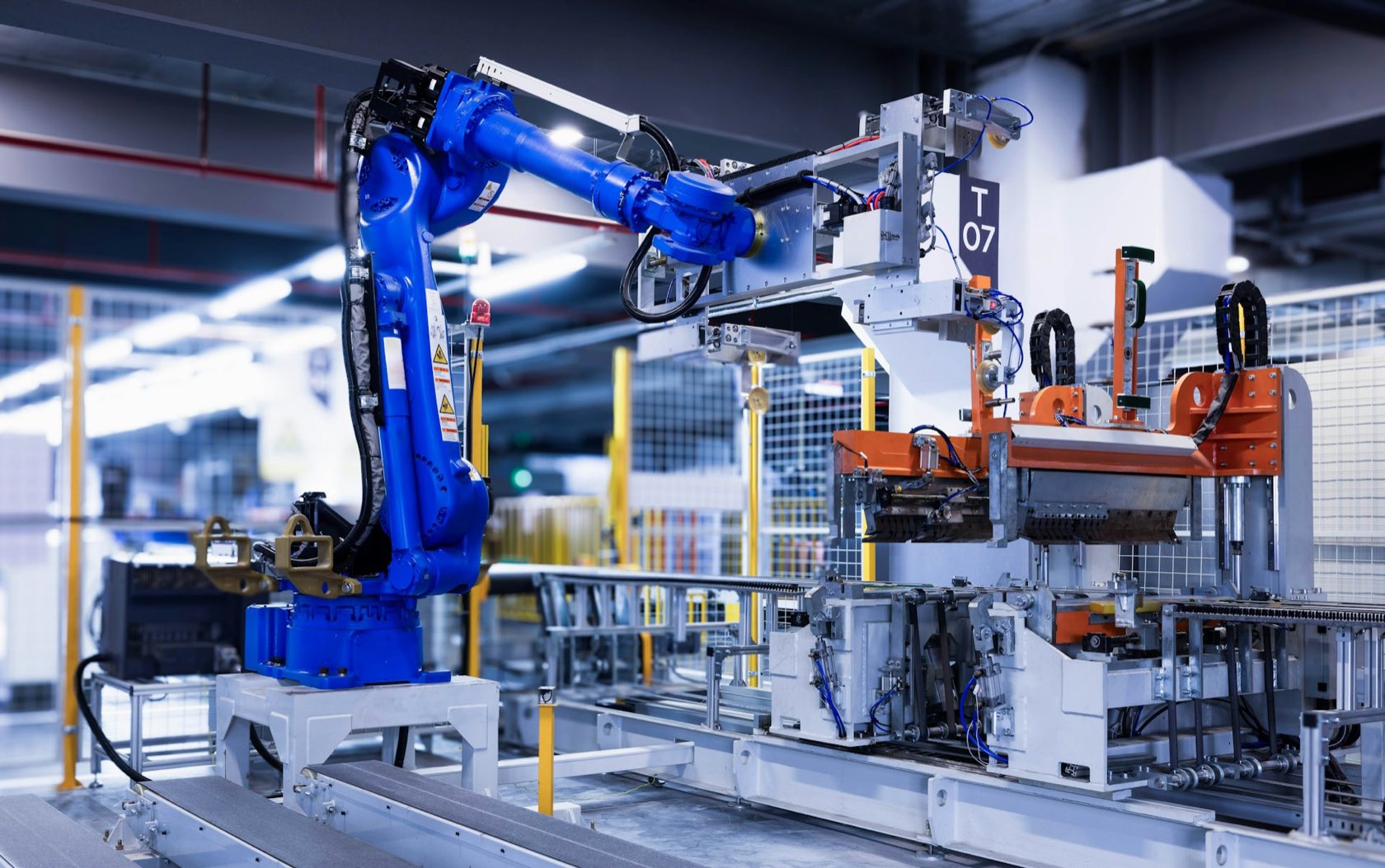 Industrial robot arm on an automated production line