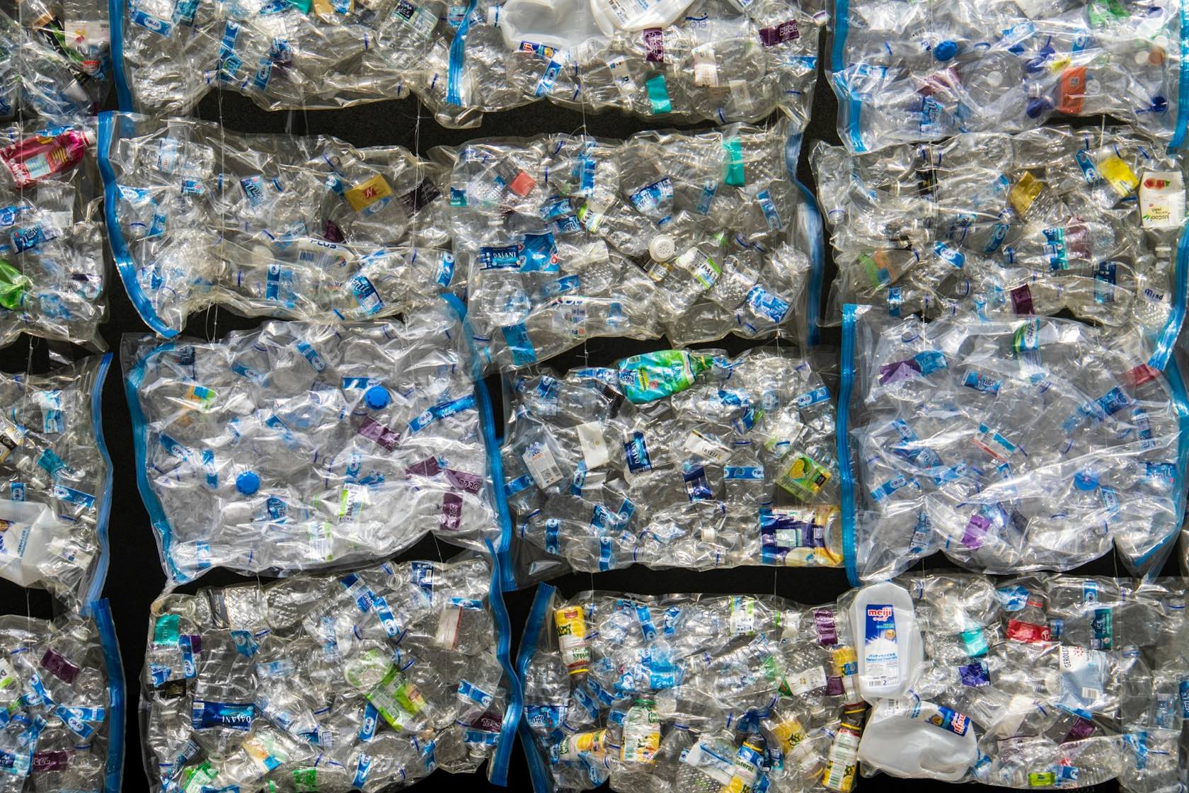 Compressed bales of PET plastic bottles